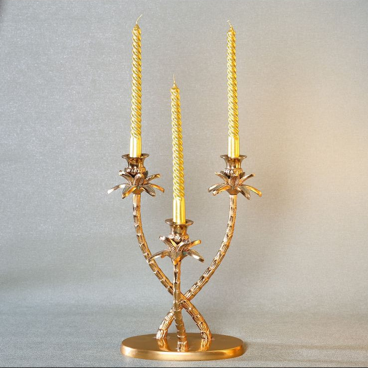 Brass oasis candle stand